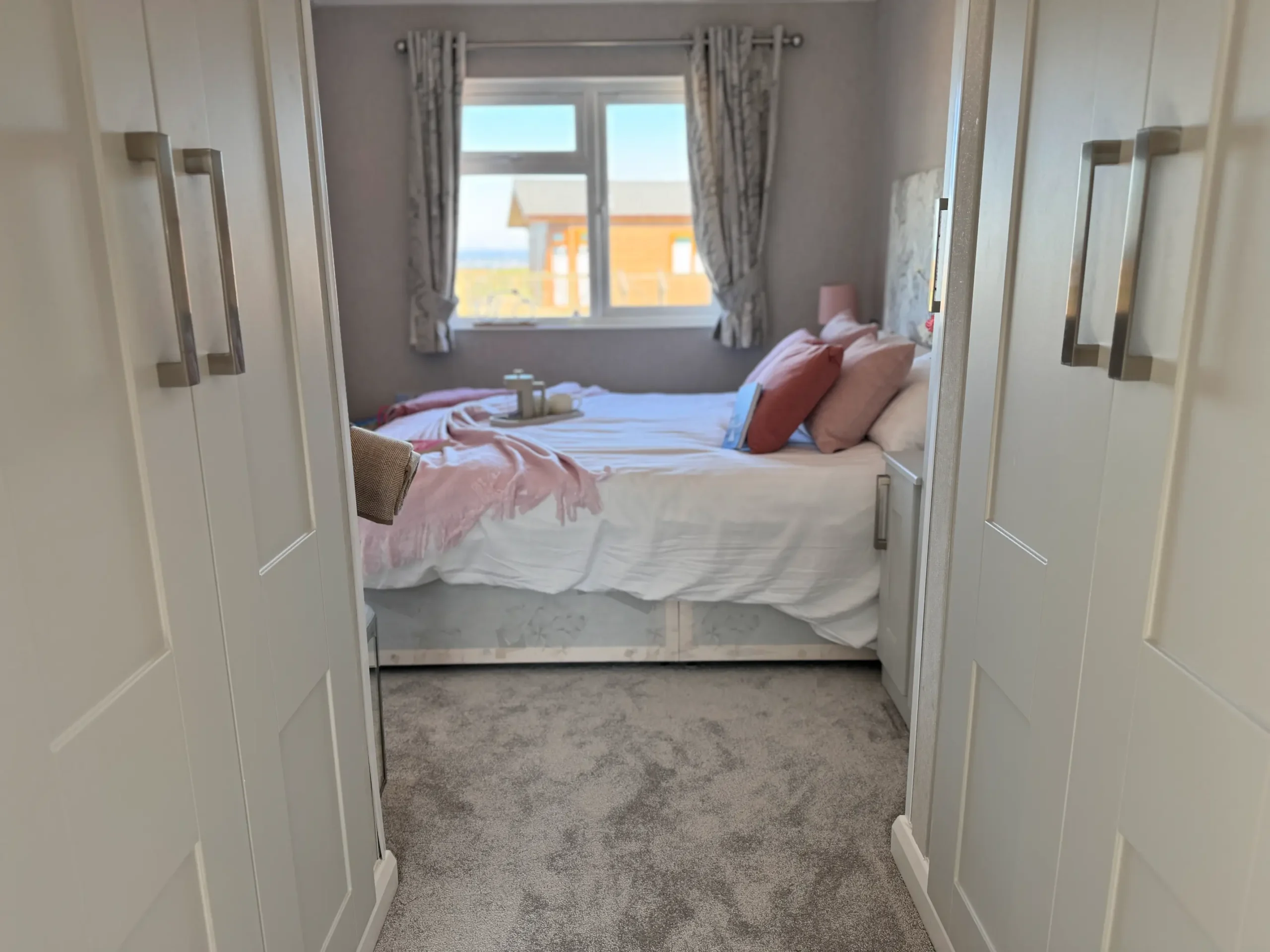Lodge 57 open-plan living area at Whitsand Bay Fort