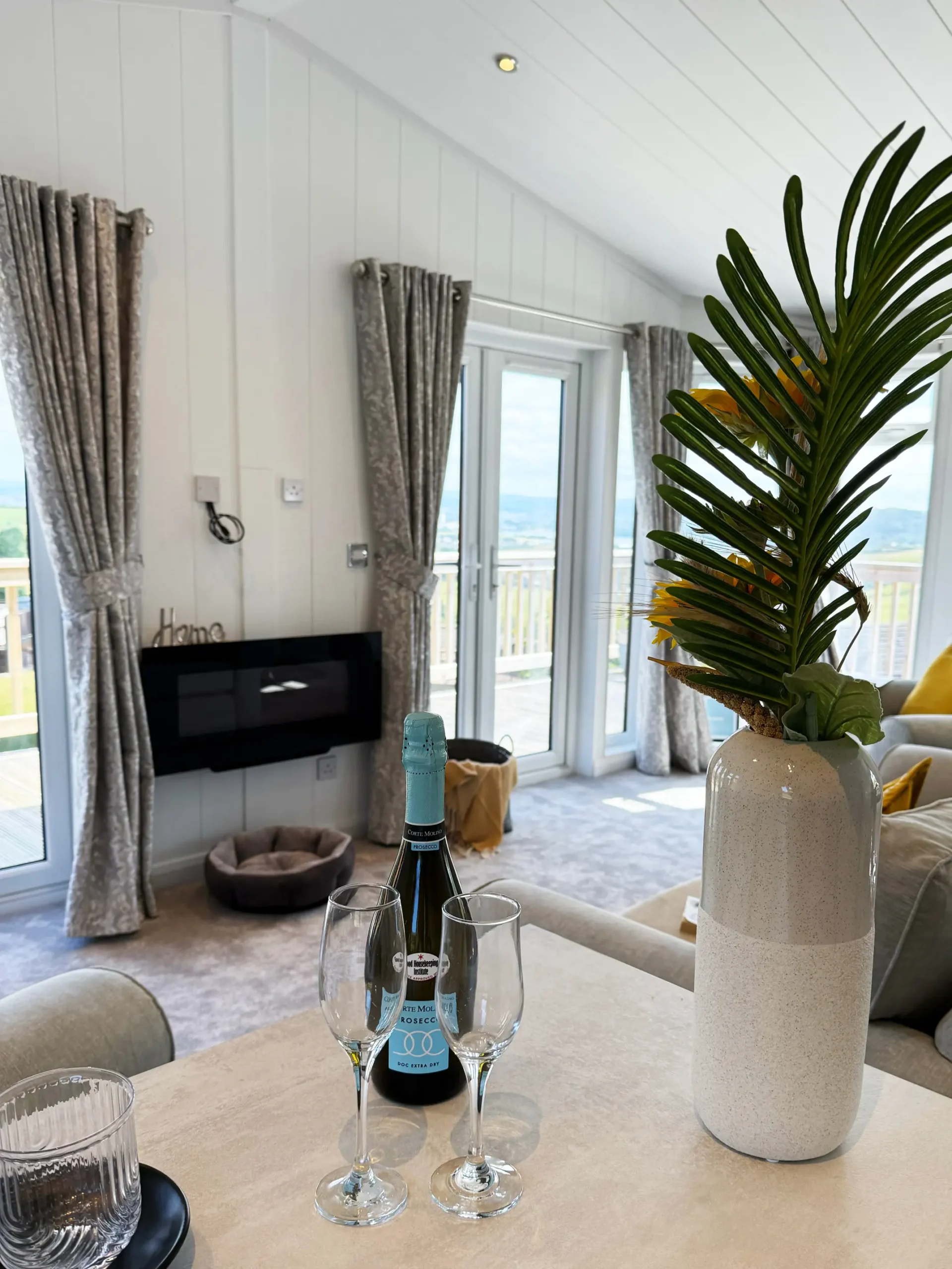 Open-plan lodge interior at Whitsand Bay Fort, near Looe
