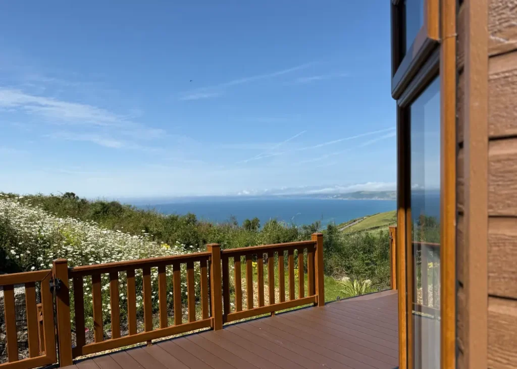 Lodge decking with sea views at Whitsand Bay Fort, the outlook to look for when buying a holiday lodge