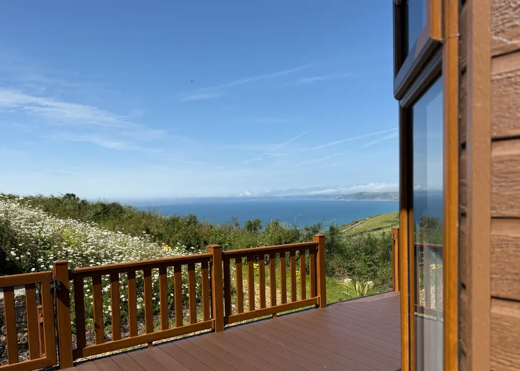 Lodge decking with sea views at Whitsand Bay Fort, the outlook to look for when buying a holiday lodge