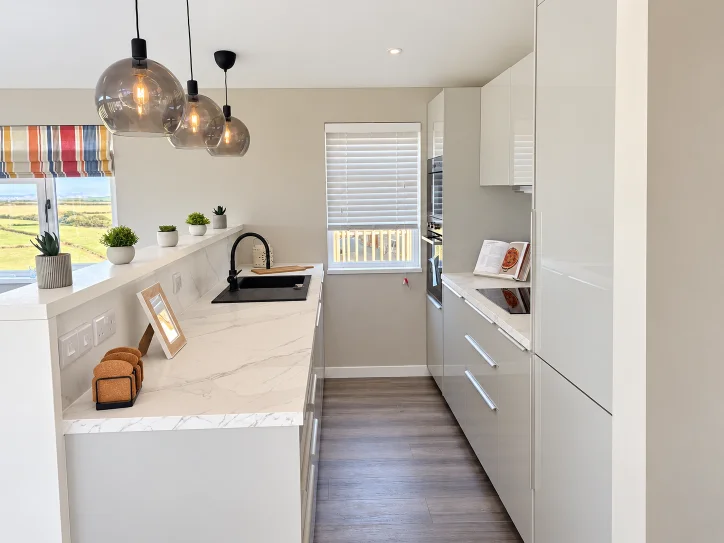 Modern lodge kitchen at Whitsand Bay Fort, where metered utilities form part of holiday lodge running costs